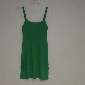 Women's green strap dress with pockets